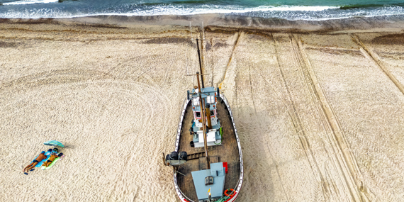 Fishing cutters at Slettestrand by the North Sea coast in Denmar