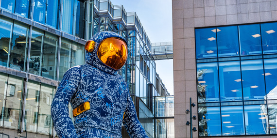 Blue Spaceman statue monument in Aker Brygge, Oslo Norway